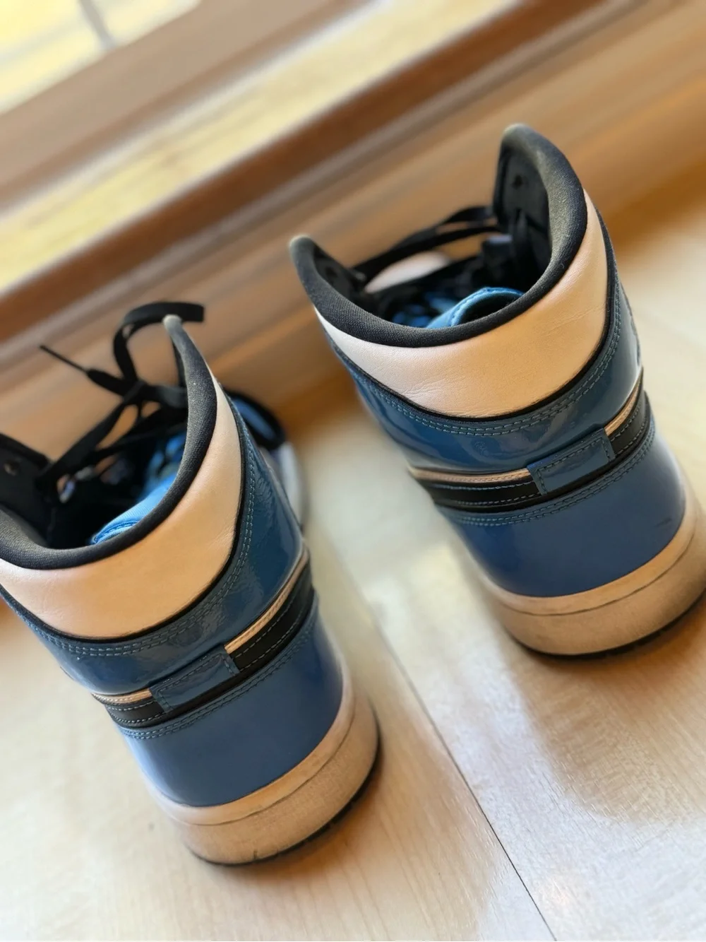Jordan Men’s High-Top Sneakers in White, Blue and Black